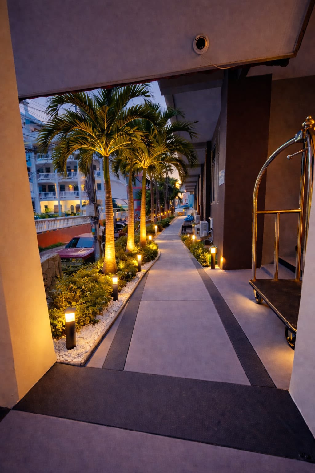 Hotel entrance illuminated at night — The Holiday Resort Pattaya